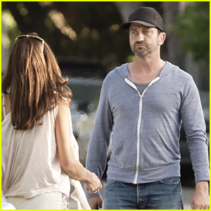 gerard-butler-girlfriend-morgan-brown-share-a-kiss.jpg